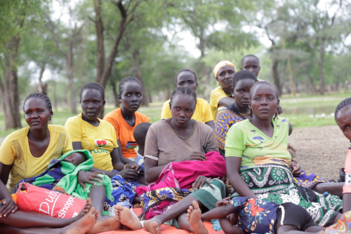 Mothers listening attentively during SRHR education sessions in Sikotai, Village in Losidok sub county in Amudat district during the mobile health clinic