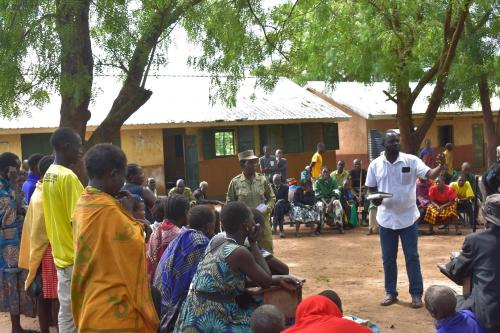Community Development Officer for Tokora Sub-County on white and the Child and Family Protection Unit of Police- Nakapiripirit district engaging the community on different forms of violence during the legal aid clinic in Tokora Sub-County