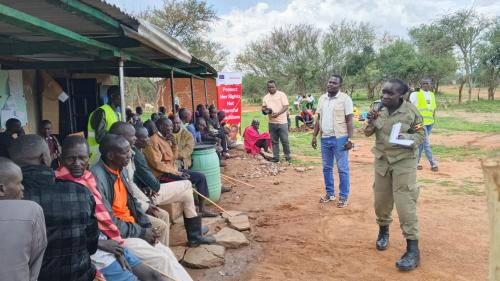 Officer from Family and Protecion Unit of Police-Amudat District engaging community members on the values of Positive parenting during the legal aid clinic in Abiliyep Sub-County