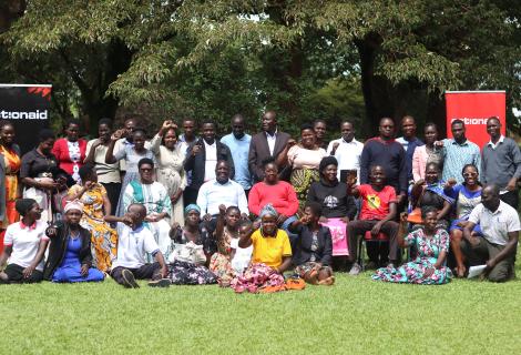 Different stakeholders pose for a group photo after the launch of the African Women Voices for Peace