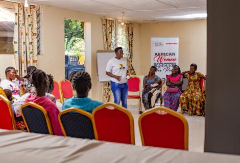 Stella shares her experience with the women during the training