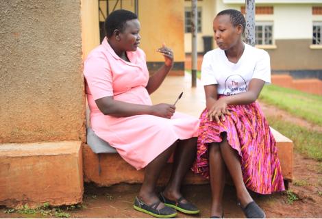 Ruth receiving advice from a senior nurse