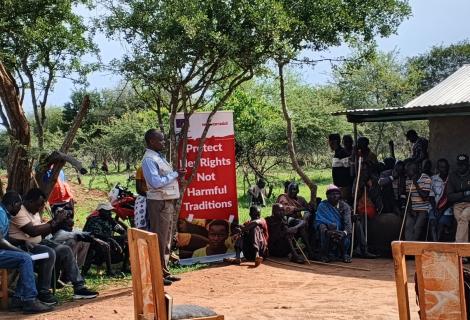 Legal officer from the Uganda Law Society sensitizing the community on the legal frameworks on FGM, Early child marriages, teenage pregnancies and all forms of violence during the legal aid clinic in Abiliyep Sub-County in Amudat District