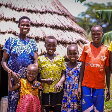 Akol and her family at their home