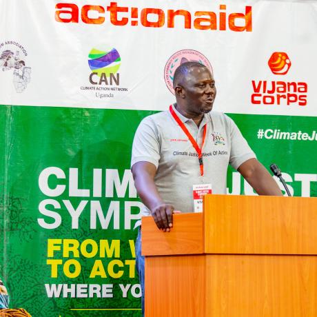 AAIU Country Director, Xavier Ejoyi, gives the opening remarks at the Climate Justice Symposium