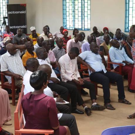 Esther Kisembo, the ActionAid Uganda FGG Coordinator, speaks to residents of Iganga during the land Awareness Week