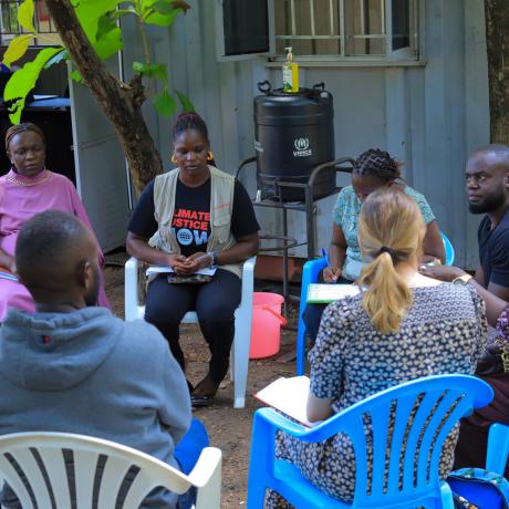The AADK team interacts with staff in Mvepi Refugee Settlement