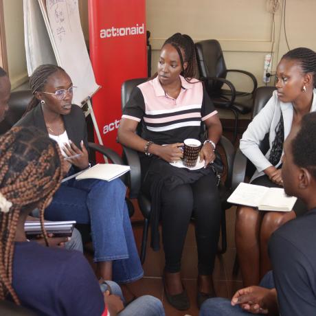Some of the youth who attended take part in a group discussion