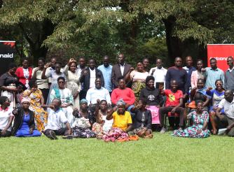 Different stakeholders pose for a group photo after the launch of the African Women Voices for Peace