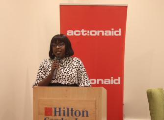 Munduru Mercy Grace, ActionAid Uganda's Head of Programs, speaks at the convening in Kampala