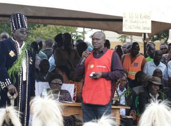 Samuel Ononge, makes remarks on behalf of Actionaid International  at the event