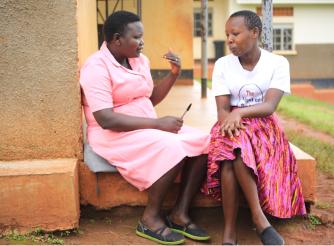 Ruth receiving advice from a senior nurse