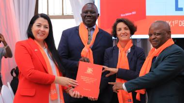 Katja, Xavier Ejoyi, Laura and Justice Batema with the Bench Book on SGBV